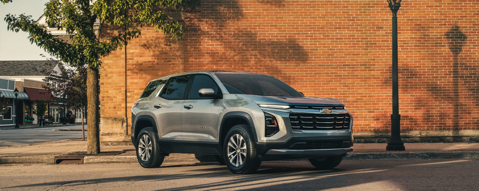 Refreshed design. Bold lines. Redesigned grille. LED lighting. Alloy wheels. Panoramic roof. Modern colors. Athletic silhouette. Chrome accents. Rugged style. Aerodynamic profile. Refined finish. Contemporary design. Sophisticated look. Elegant appearance. Modern SUV. Distinctive style. Road presence. 2026 release. Chevrolet design.