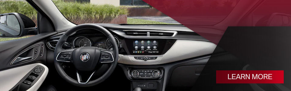 the best city suv the 2022 buick encore gx seen from the inside with the center console