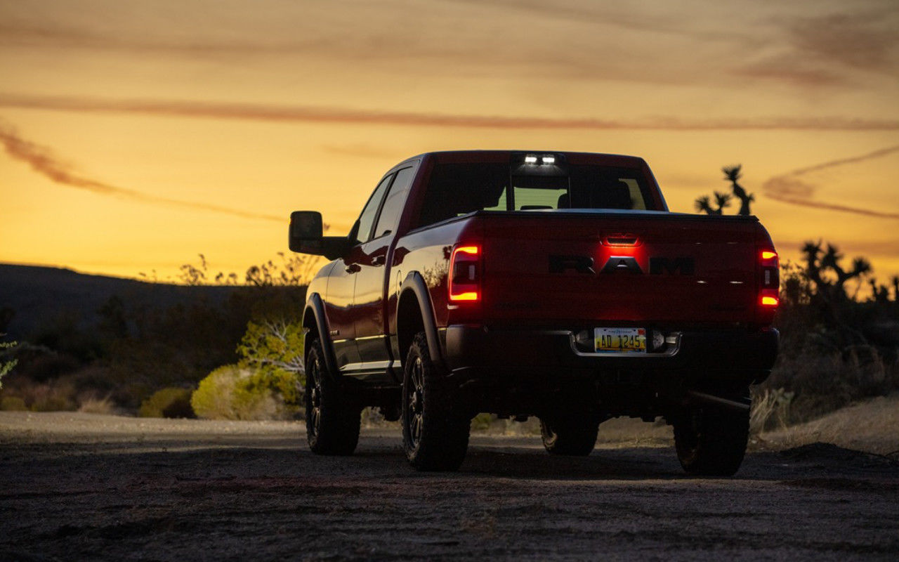 rear side view of a 2023 RAM 1500 at dusk
