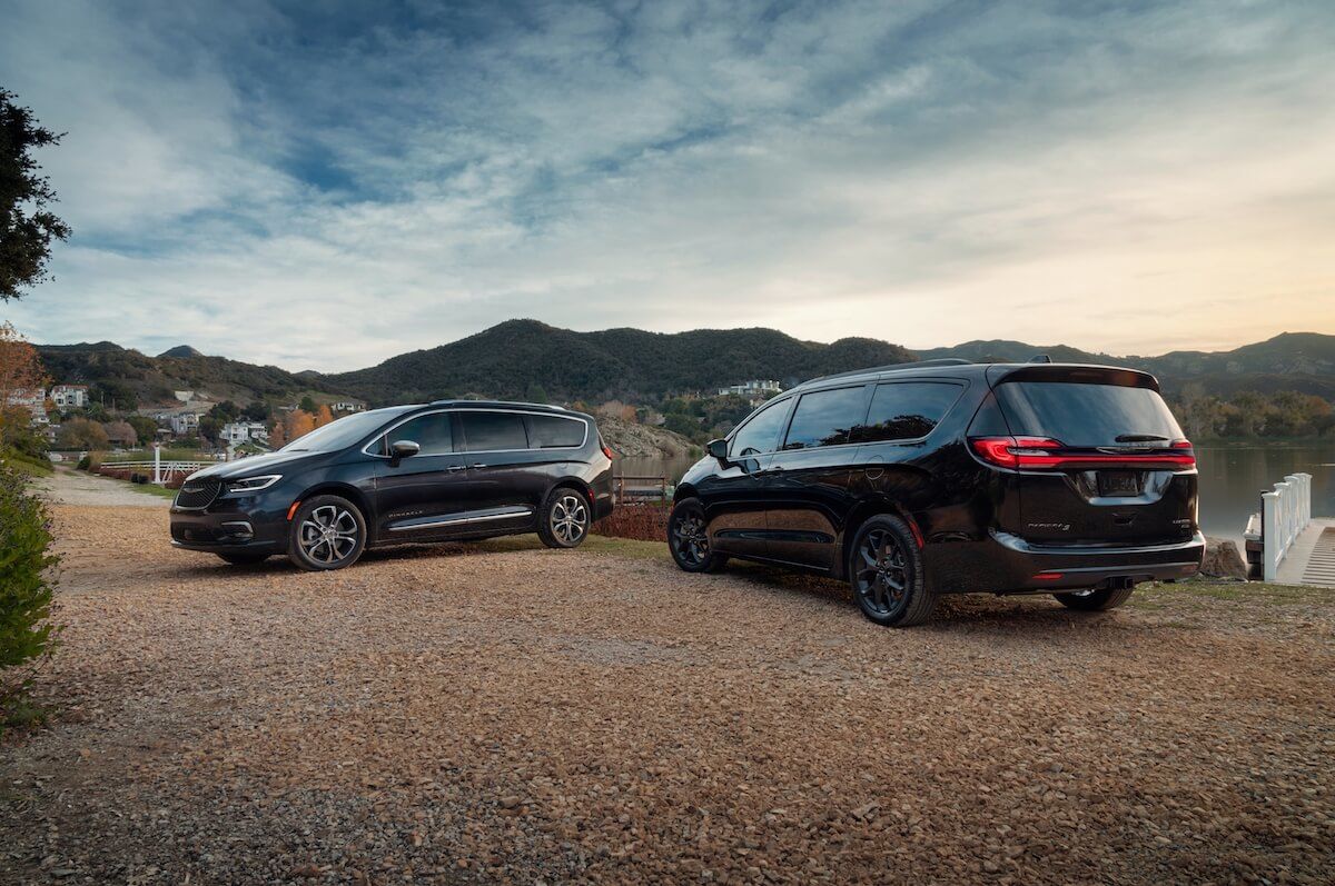 view of two 2021 Chrysler Pacifica near a lake
