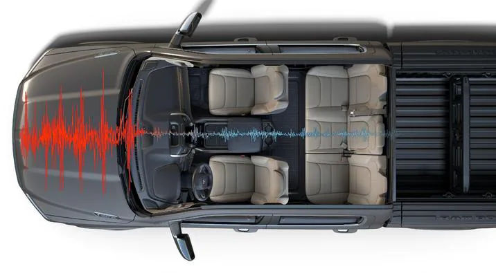 vue en survol semi transparente d'un camion avec représentation visuelle d'un système de réduction de bruit