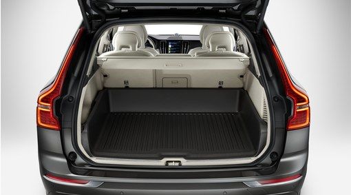 The trunk of a Volvo car with a load liner installed.