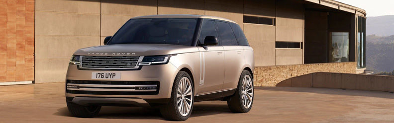 The 2023 Land Rover Range Rover in blue on the beach