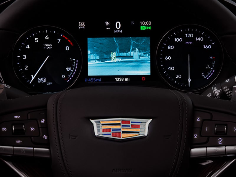 View of the dashboard with Cadillac's Night Vision mode activated