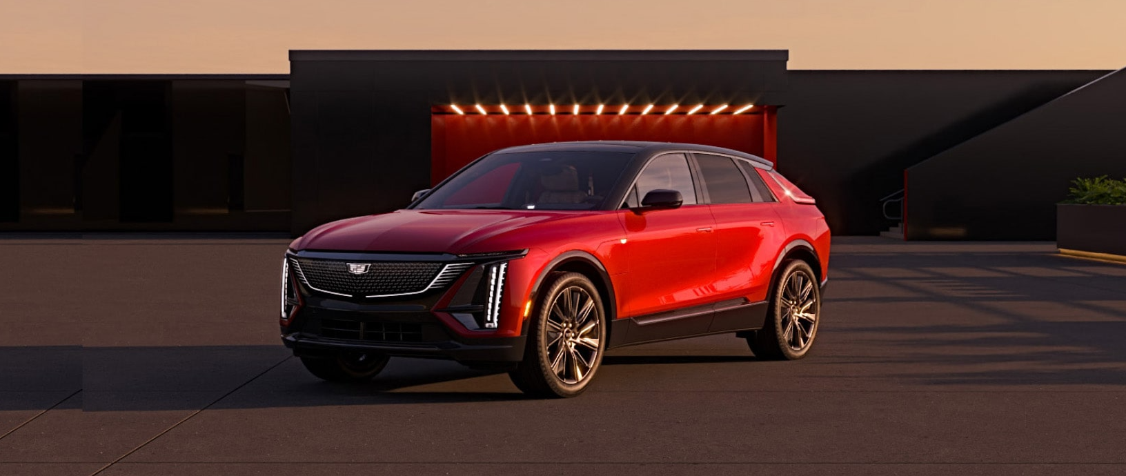 Front view of a 2025 Cadillac parked in front of a commercial location