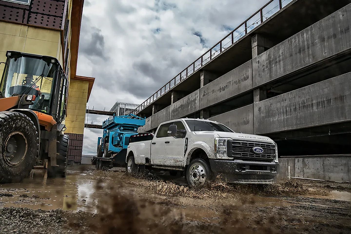 White pickup with some tractor