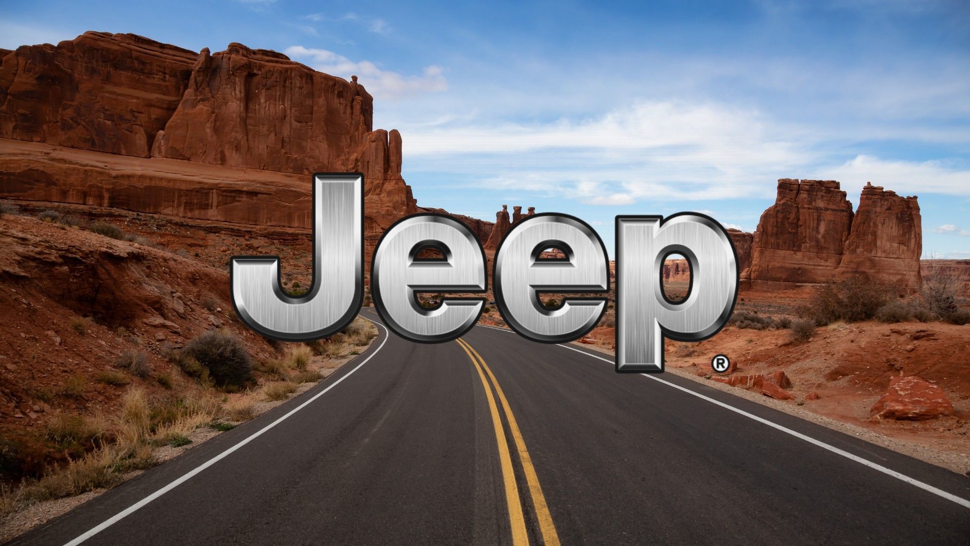 Logo Jeep sur une route d&eacute;sertique, pour pr&eacute;senter un top 5 des meilleurs VUS Jeep au Canada.