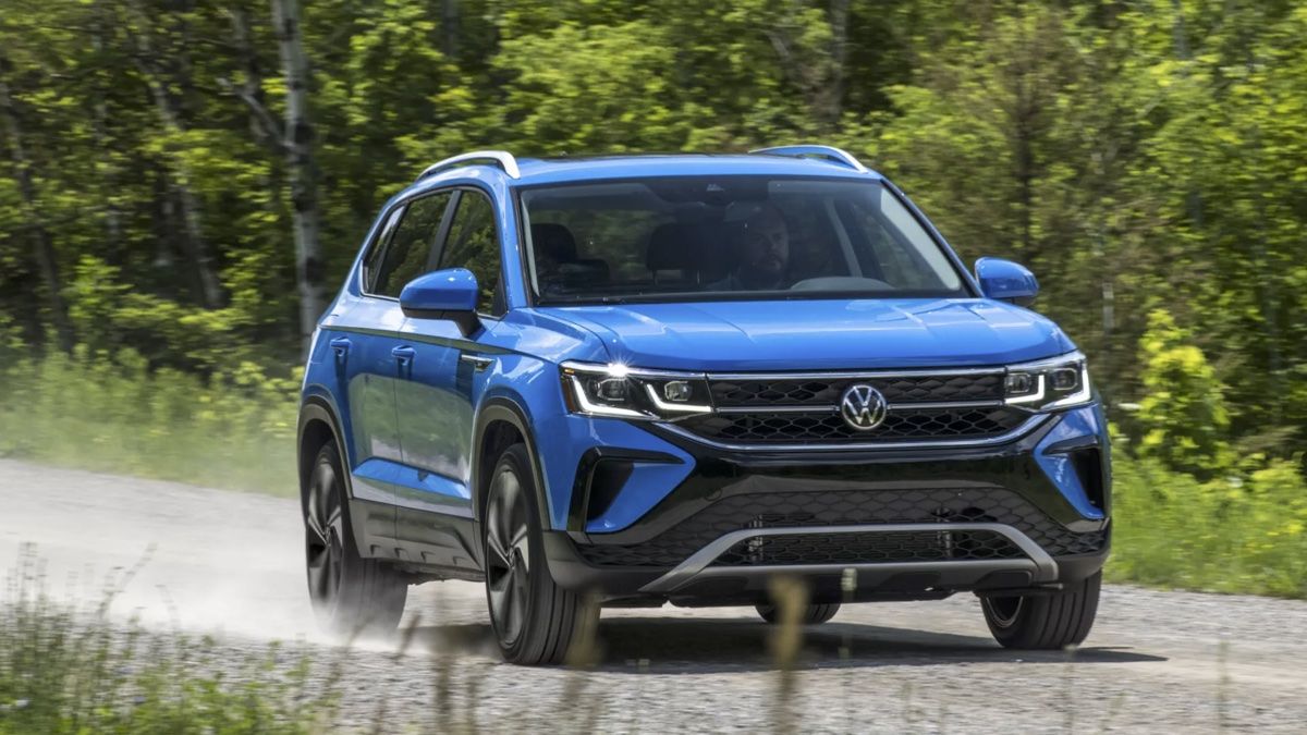 The Volkswagen Taos 2024 on a gravel road.