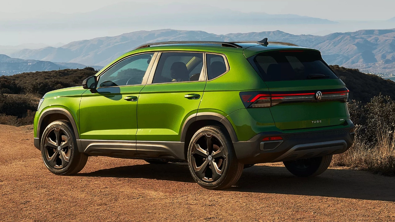 Side view of the Volkswagen Taos driving on a road