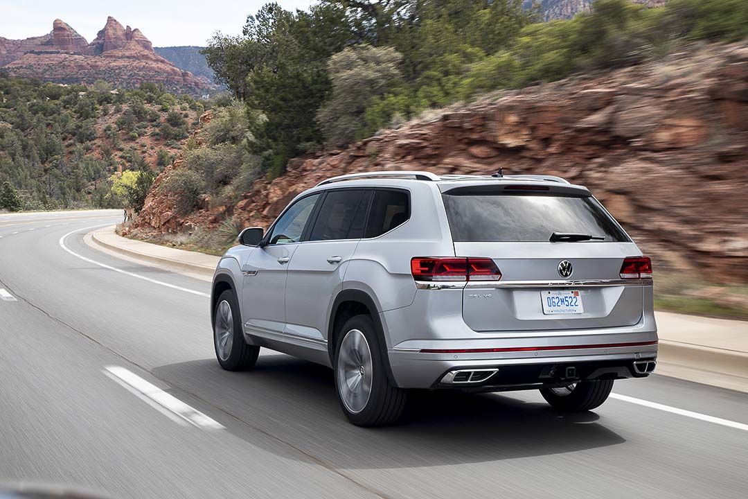 three quarter rear view of the 2021 VW Atlas driven on a road