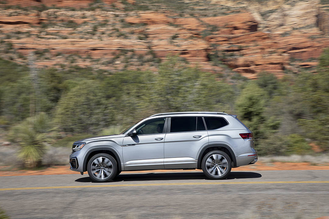 side view of the 2021 VW Atlas driven on a road 