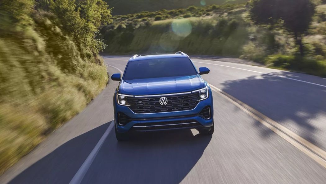 Front view of the 2024 VW Atlas Cross Sport on the road.