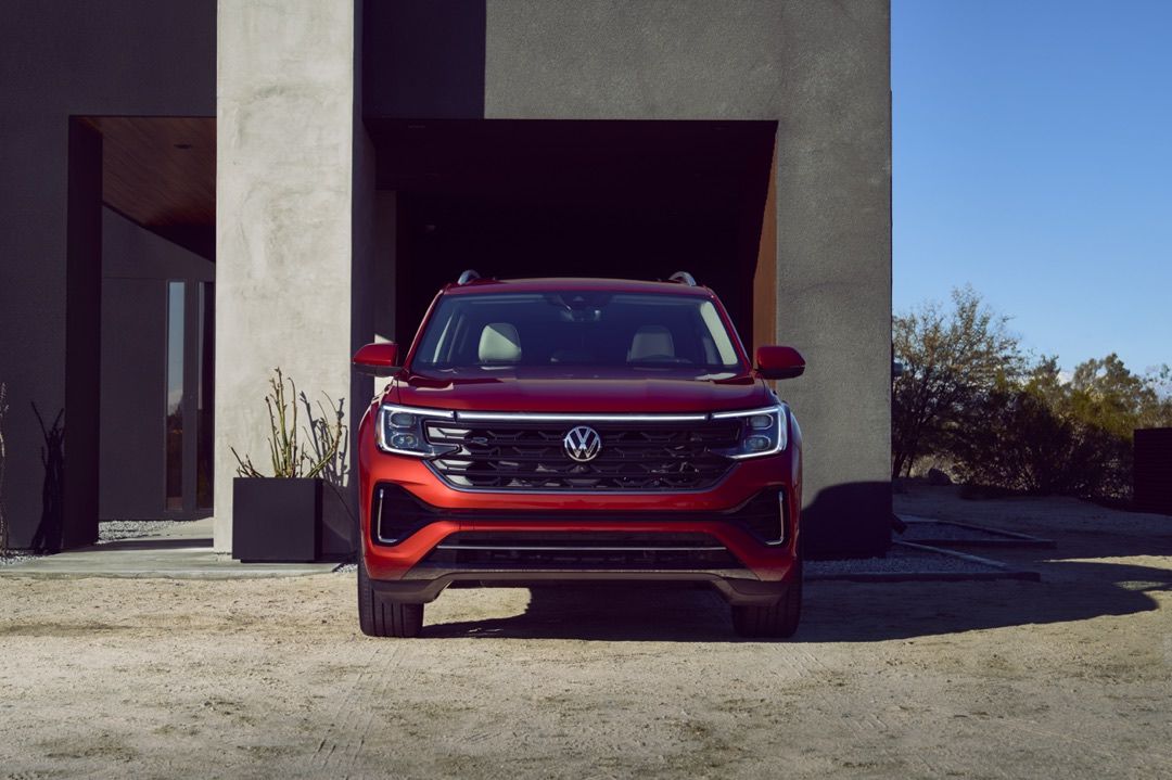 Front view of the 2024 Volkswagen Atlas parked outdoors.