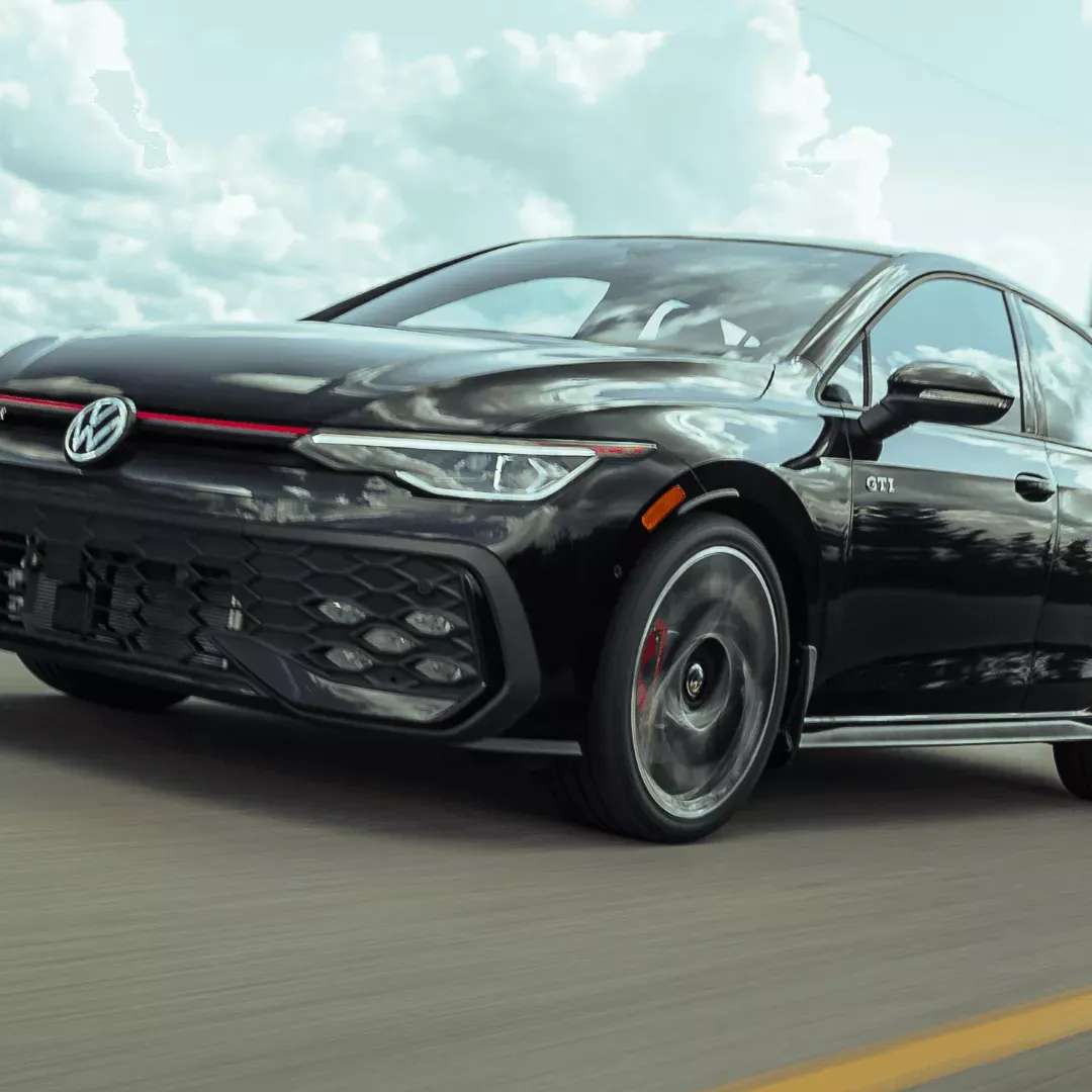 Black 2026 Volkswagen Golf GTI with 2.0 L turbocharged engine.