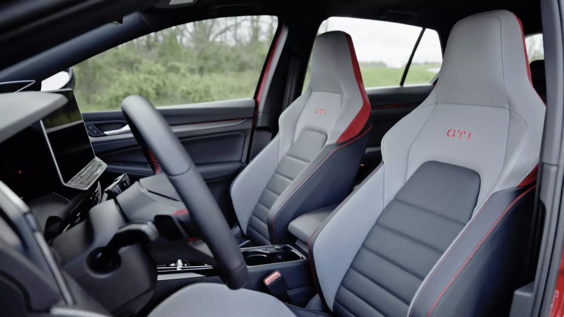 2026 Volkswagen Golf GTI cabin with sport seats.