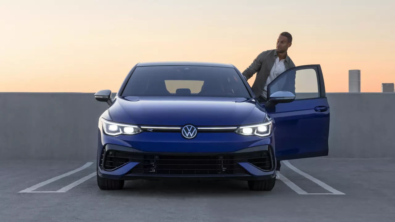 Front view of Volkswagen Golf R in a parking lot.