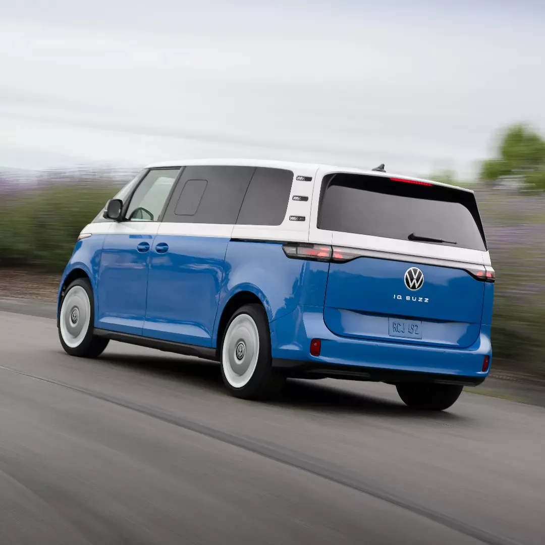 2025 Volkswagen ID. Buzz electric on the road to compare monthly EV costs.