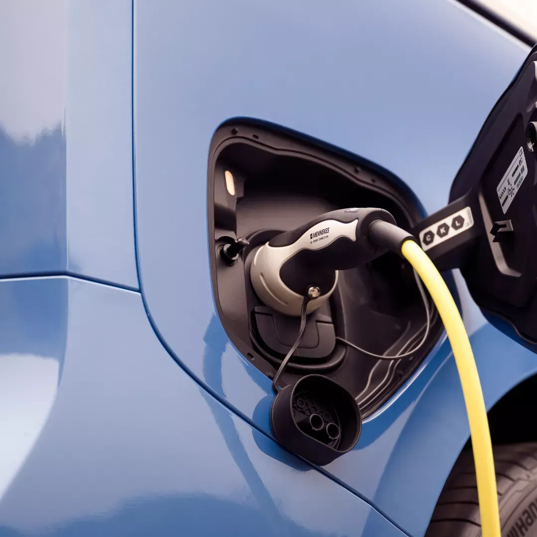 Green 2025 Volkswagen ID. Buzz to illustrate ways to reduce the monthly cost of an electric car.