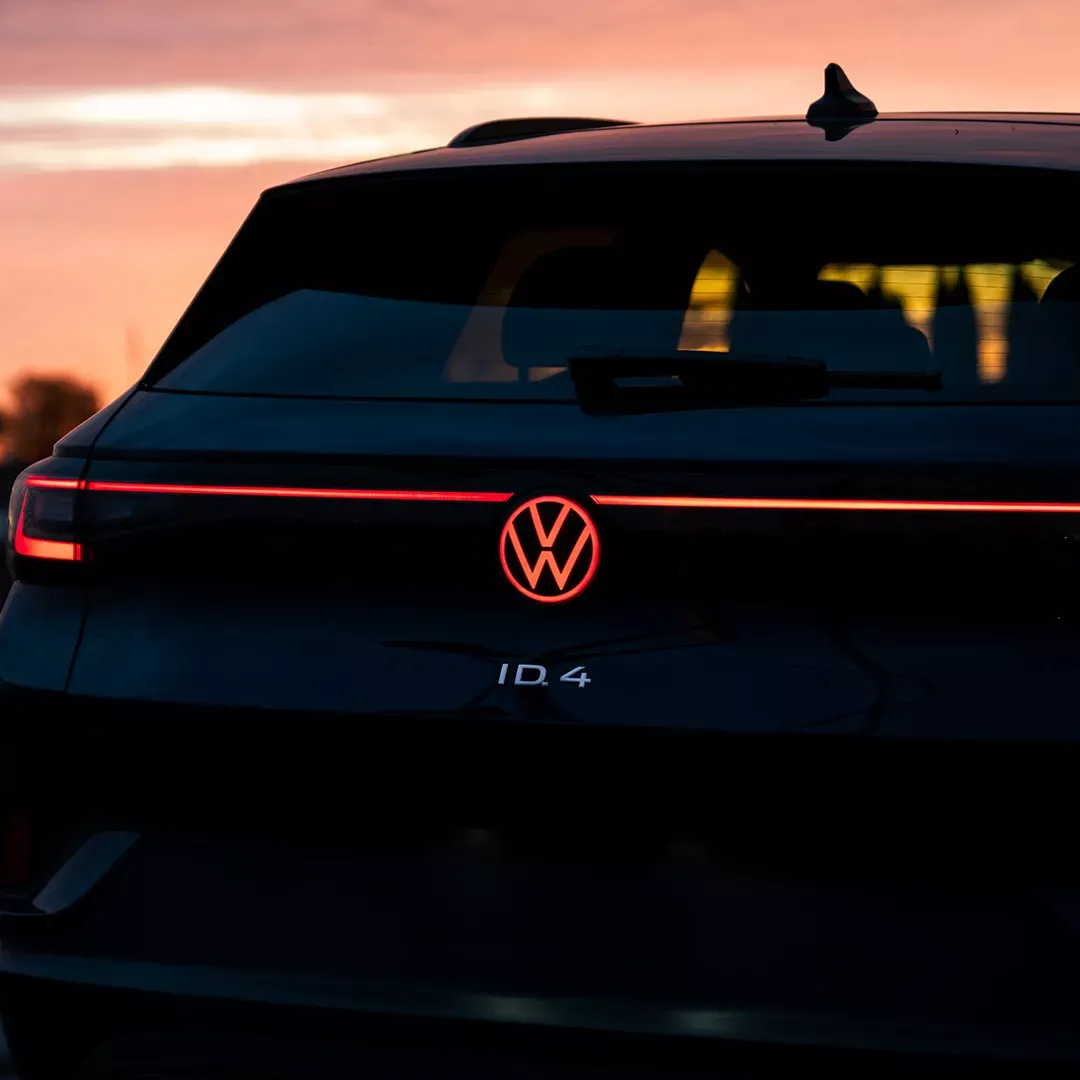 Rear of a 2025 Volkswagen ID.4 at sunset to illustrate the monthly vehicle payment.
