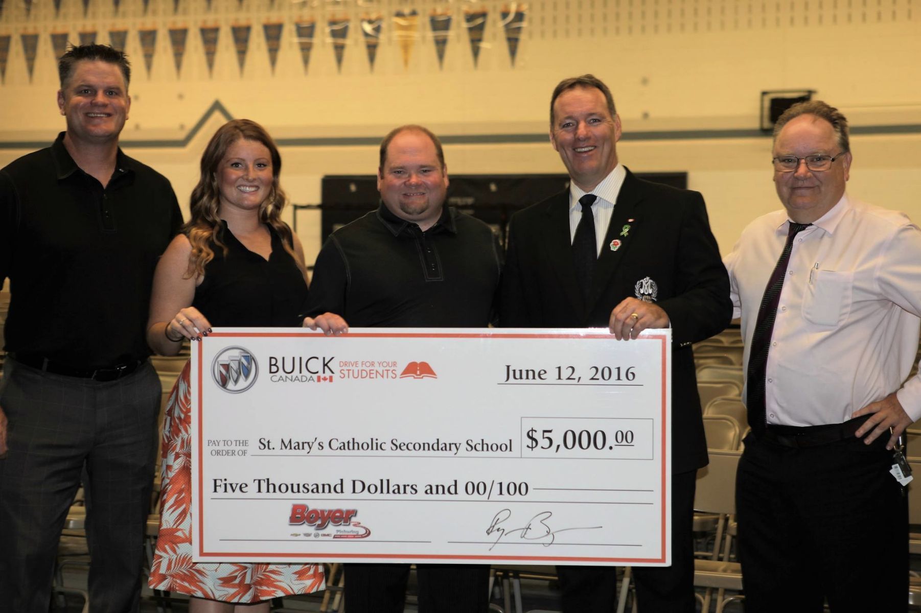 Michael Boyer GM Pickering Raises $5,000 for local High School