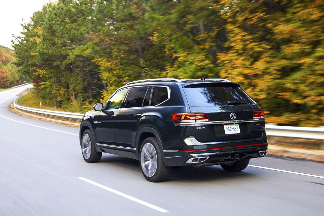 2022 VW Atlas rear 3/4 view driving on a road