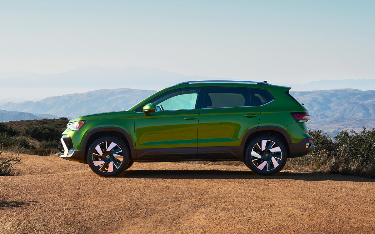 lateral view of a 2025 VW Taos in the mountains