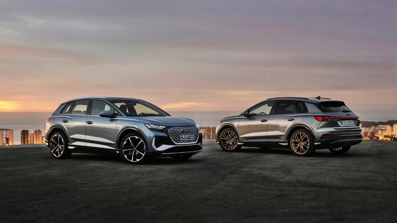 view of a duo of 2025 audi Q4 e-tron on a plateau at dusk