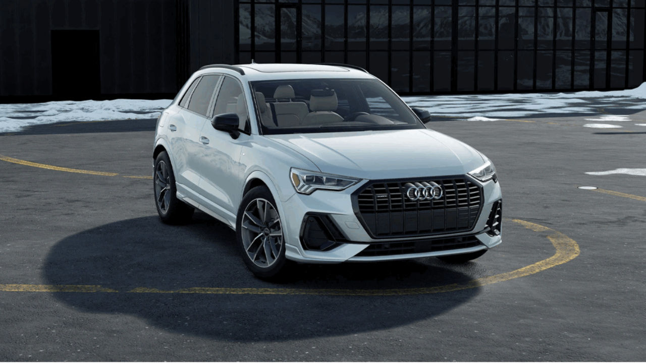 front side view of a 2025 Audi Q3 2025 in a snowy parking lot