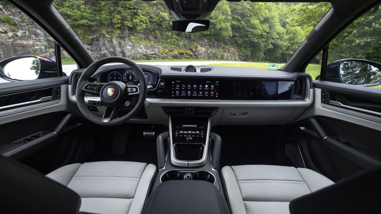 cockpit and dashboard view of a 2026 Porsche Cayenne EV