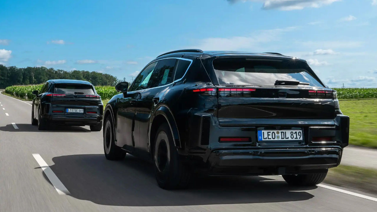 rear side view of two 2026 Porsche Cayenne EV