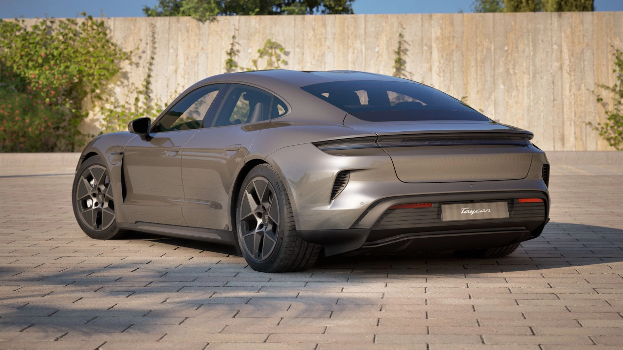Rear three-quarter view of the Porsche Taycan 2027 parked in an outdoor setting