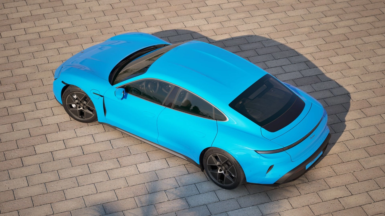 Rear view of the Porsche Taycan showing the signature continuous LED light strip