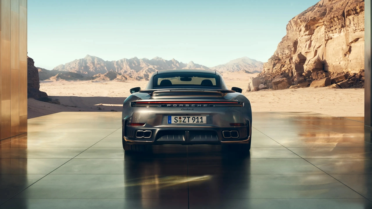 Rear view of a Porsche 911 Turbo showing its distinctive spoiler and lighting