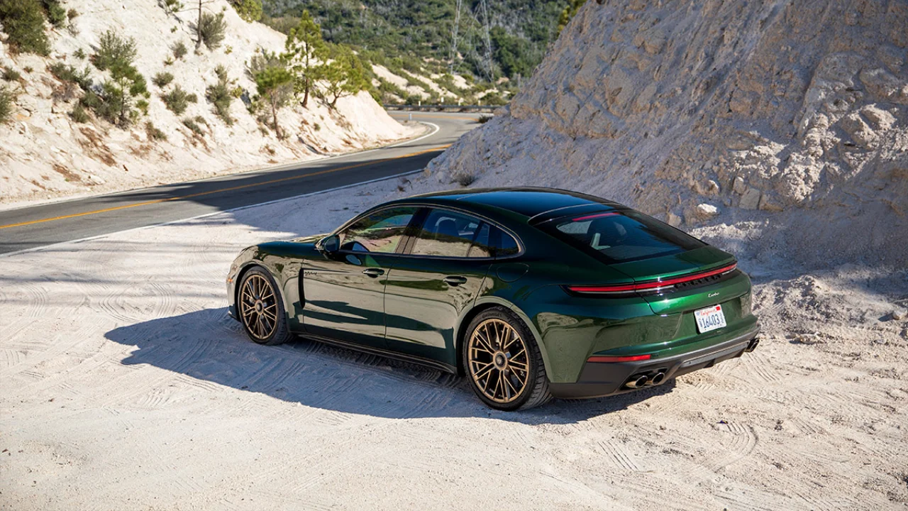 Front three-quarter view of a Porsche Panamera Turbo parked in an urban environment