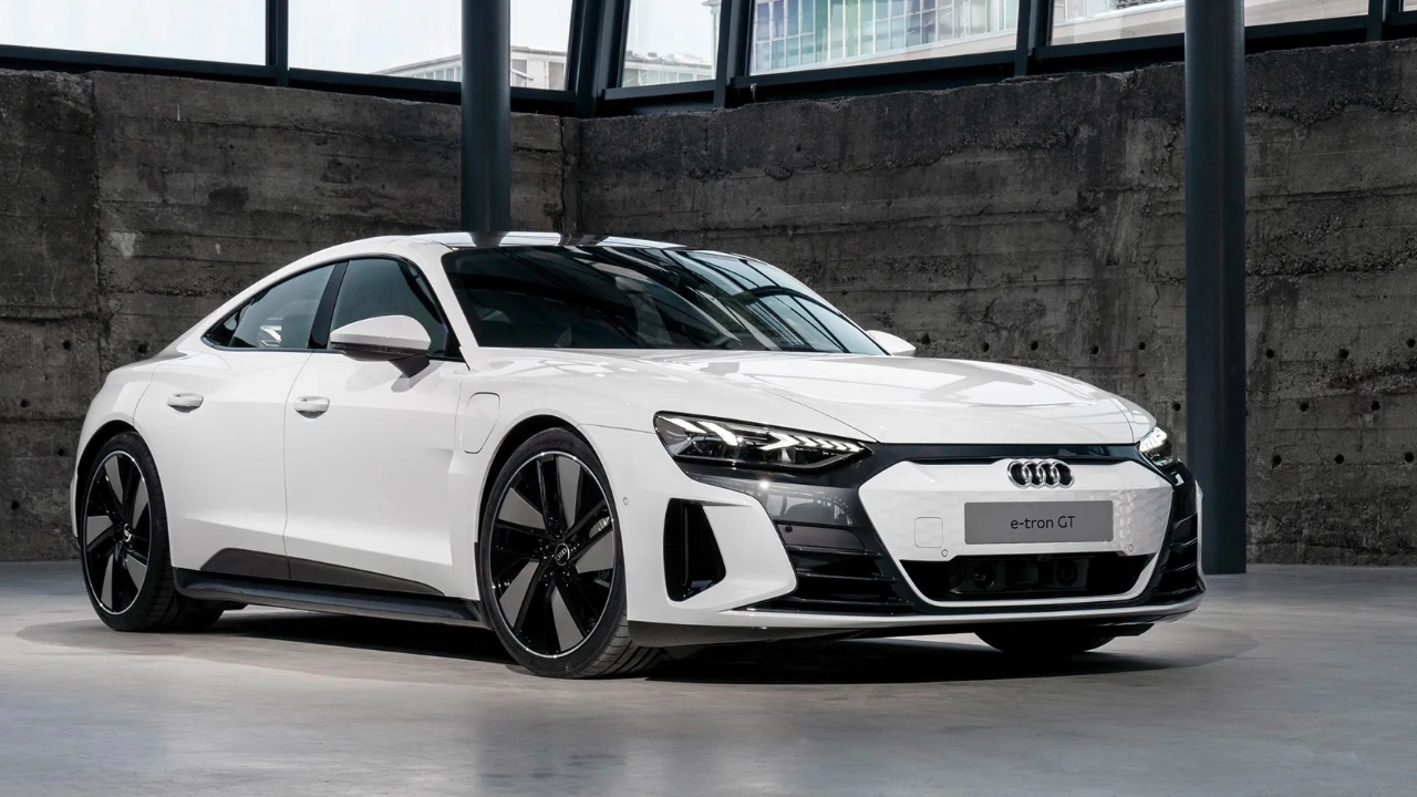 Side view of an electric Audi e-tron showcasing its sleek aerodynamic body
