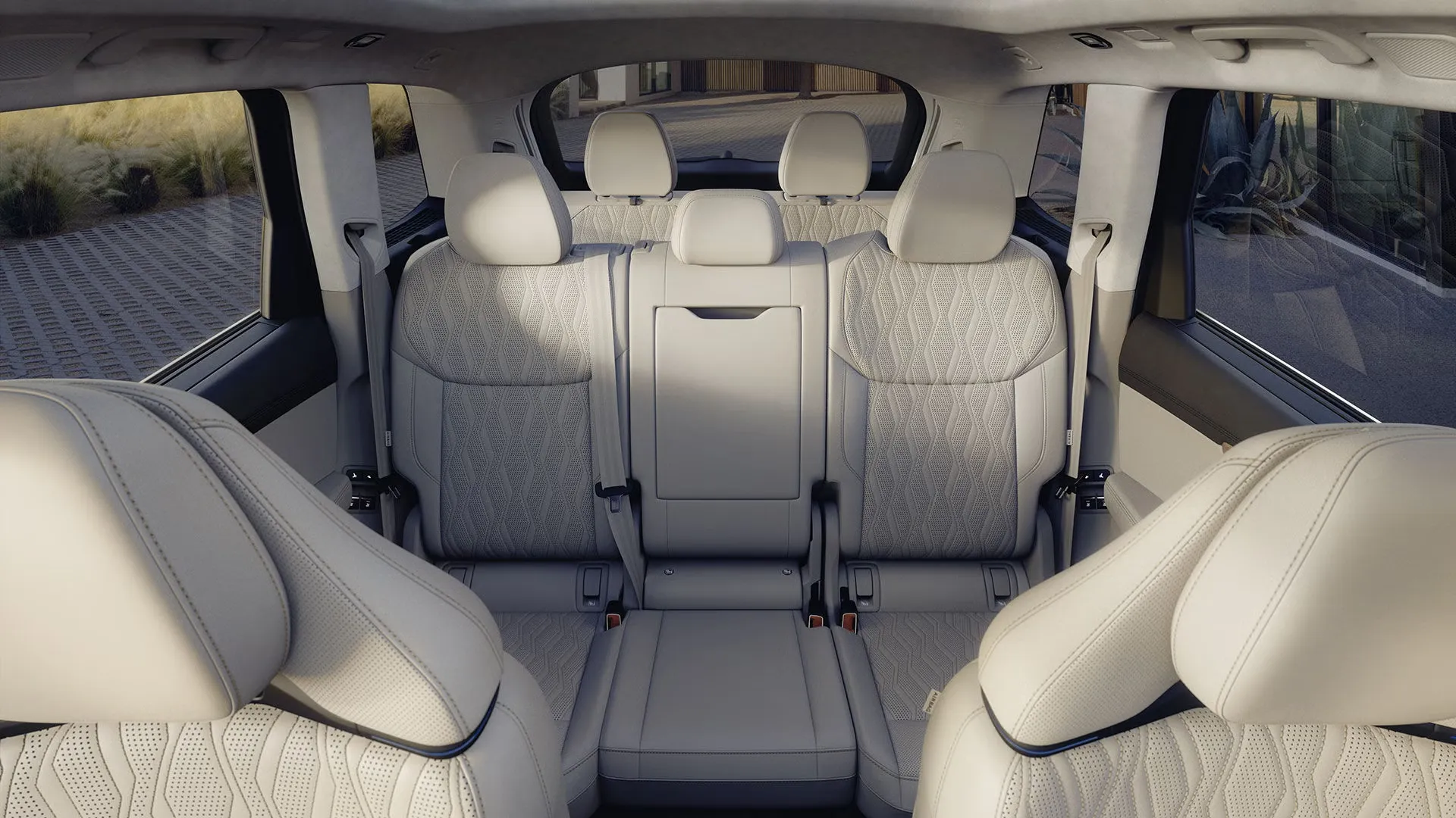 View of the three rows of light leather seating in the seven-passenger 2027 Audi Q7.