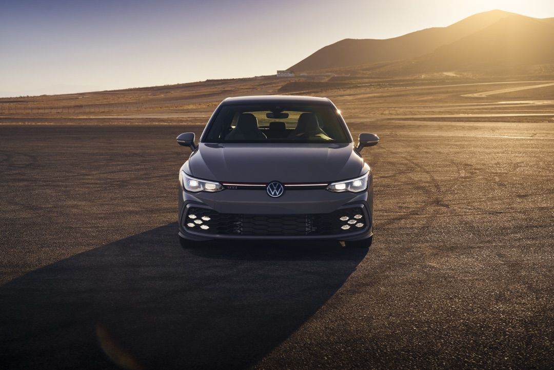VW GTI 2022 including its oversized honeycomb grille sitting on the front bumper and flanked with 5 small fog lights