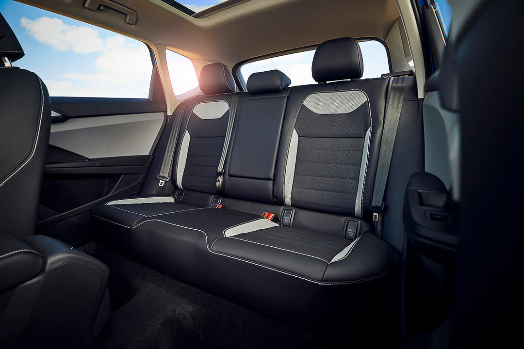The rear seats of a 2022 VW Taos and a 2022 VW Tiguan