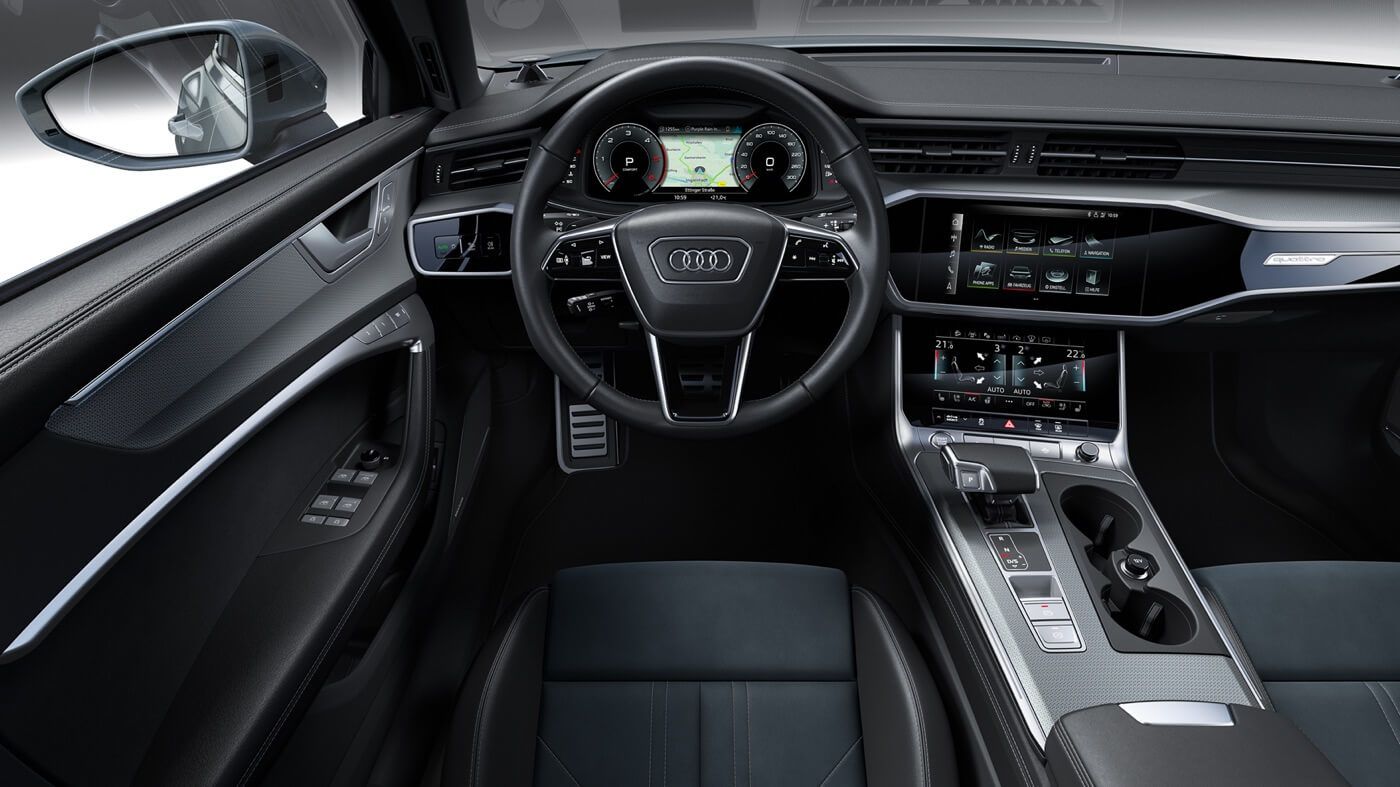 Front interior of an Audi A6 allroad including its heated steering wheel and all technologies