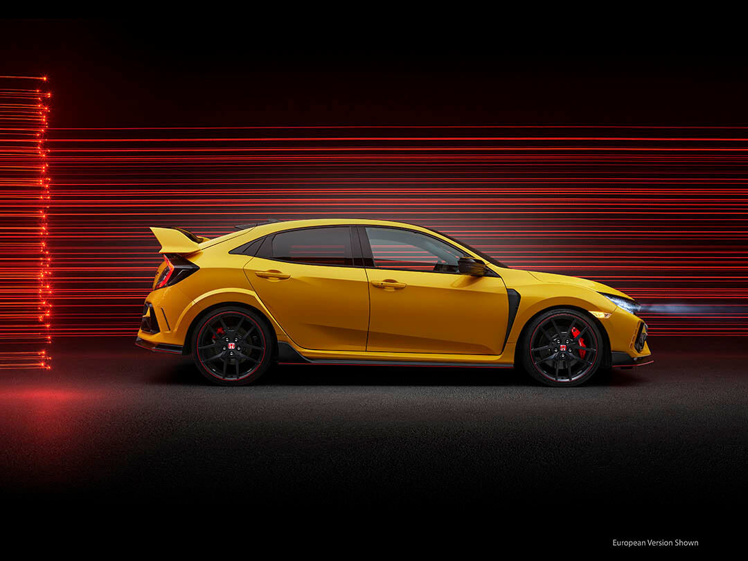 Side view of a 2021 Honda Civic Type R on a background of reddish lines