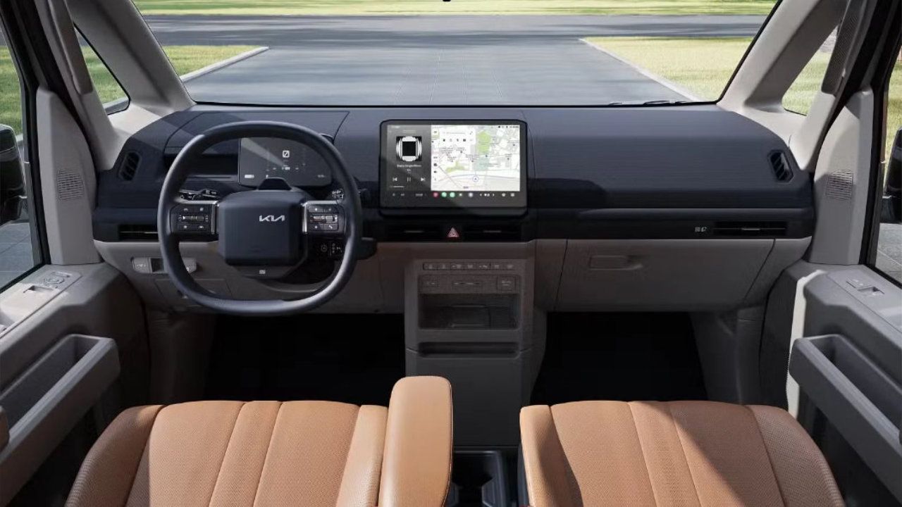 vue de l'habitacle et du tableau de bord d'un Kia PV5 2026