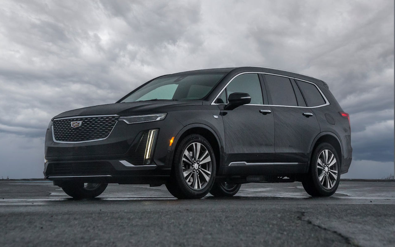 front side view of a 2024 Cadillac XT6 under a cloudy sky