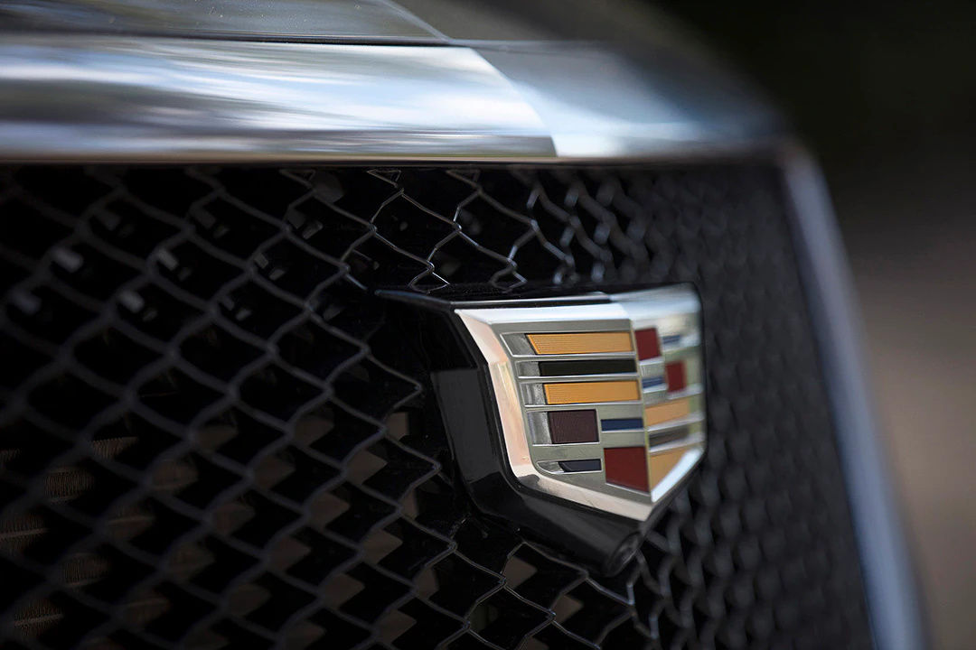 close up front view of the grille and brand logo of the 2022 Cadillac XT5