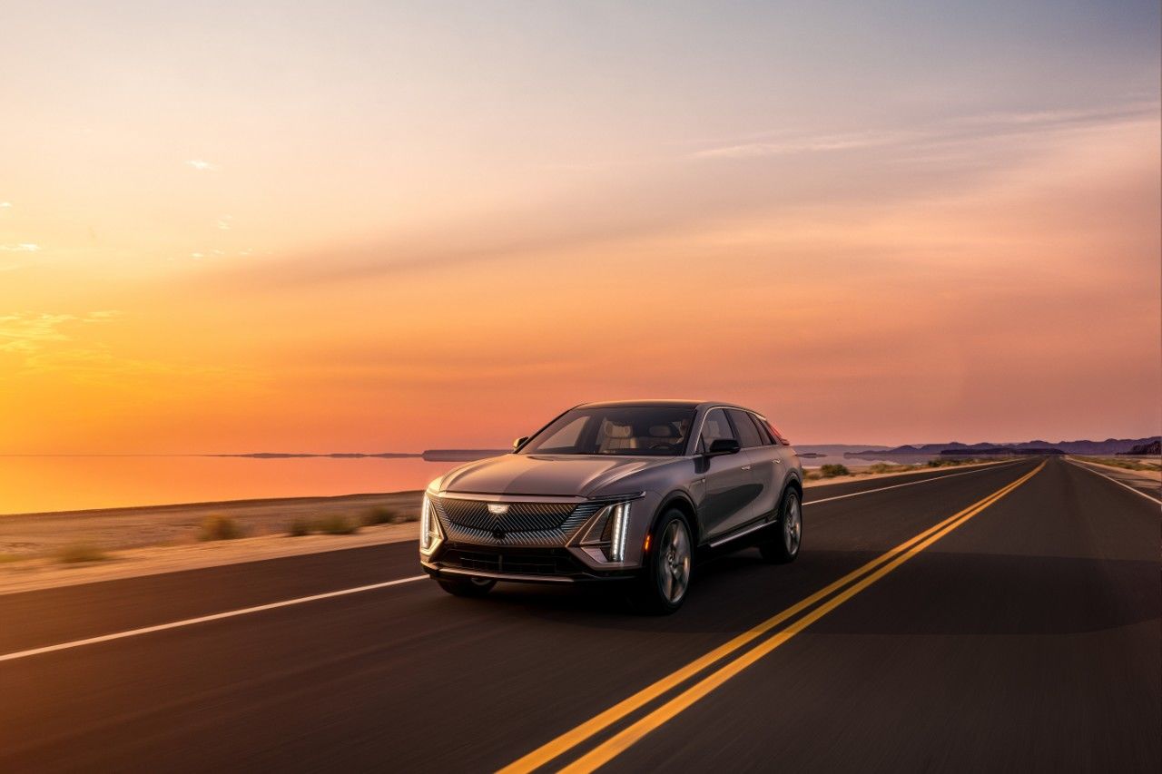 front side view of a 2023 Cadillac Lyriq at sunset