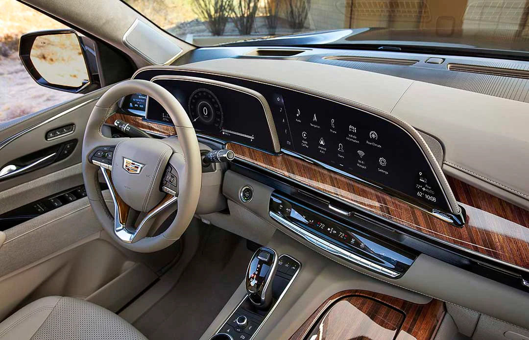 view of the steering wheel and the 38-inch dashboard screen inside of the 2022 Cadillac Escalade
