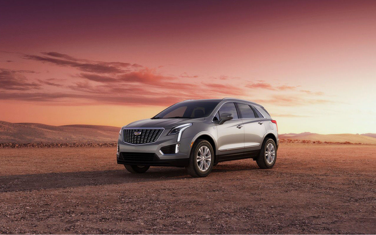 Front 3/4 view of the 2023 Cadillac XT5 on desert land.