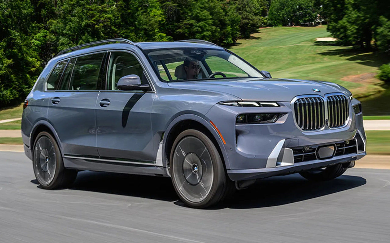 front side view of a 2023 BMW X7 on a country road