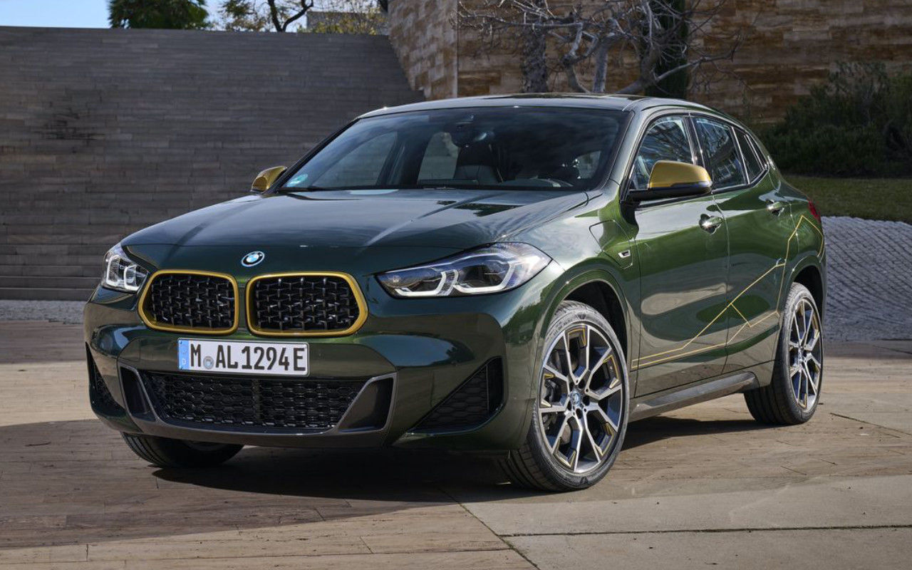 front side view of a 2023 BMW X2 on a public square