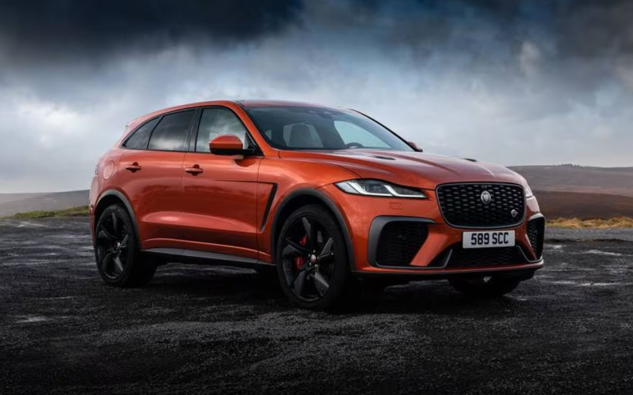 front side view of a 2024 Jaguar F-Pace under a cloudy sky