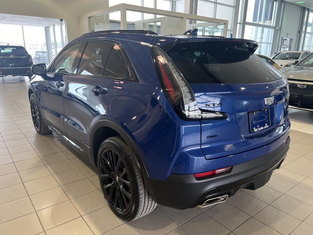 Rear view of a used Cadillac XT4.